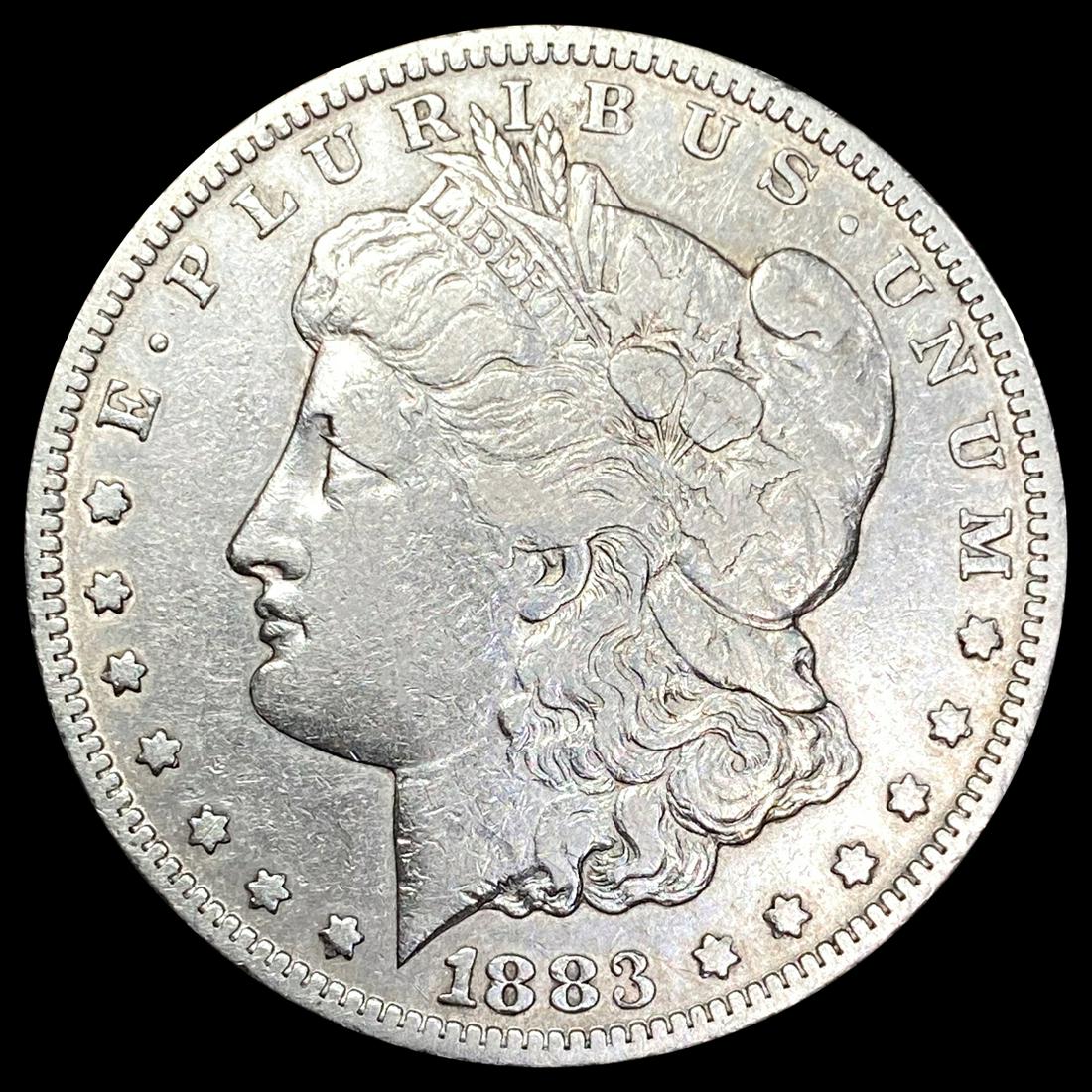 1883-CC Morgan Silver Dollar NEARLY UNCIRCULATED (1 of 2)