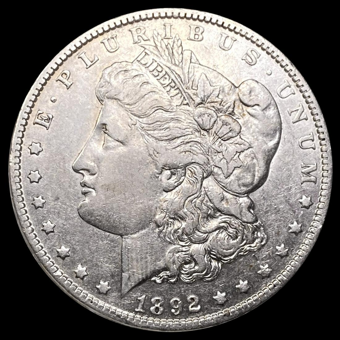 1892-O Morgan Silver Dollar NEARLY UNCIRCULATED (1 of 2)