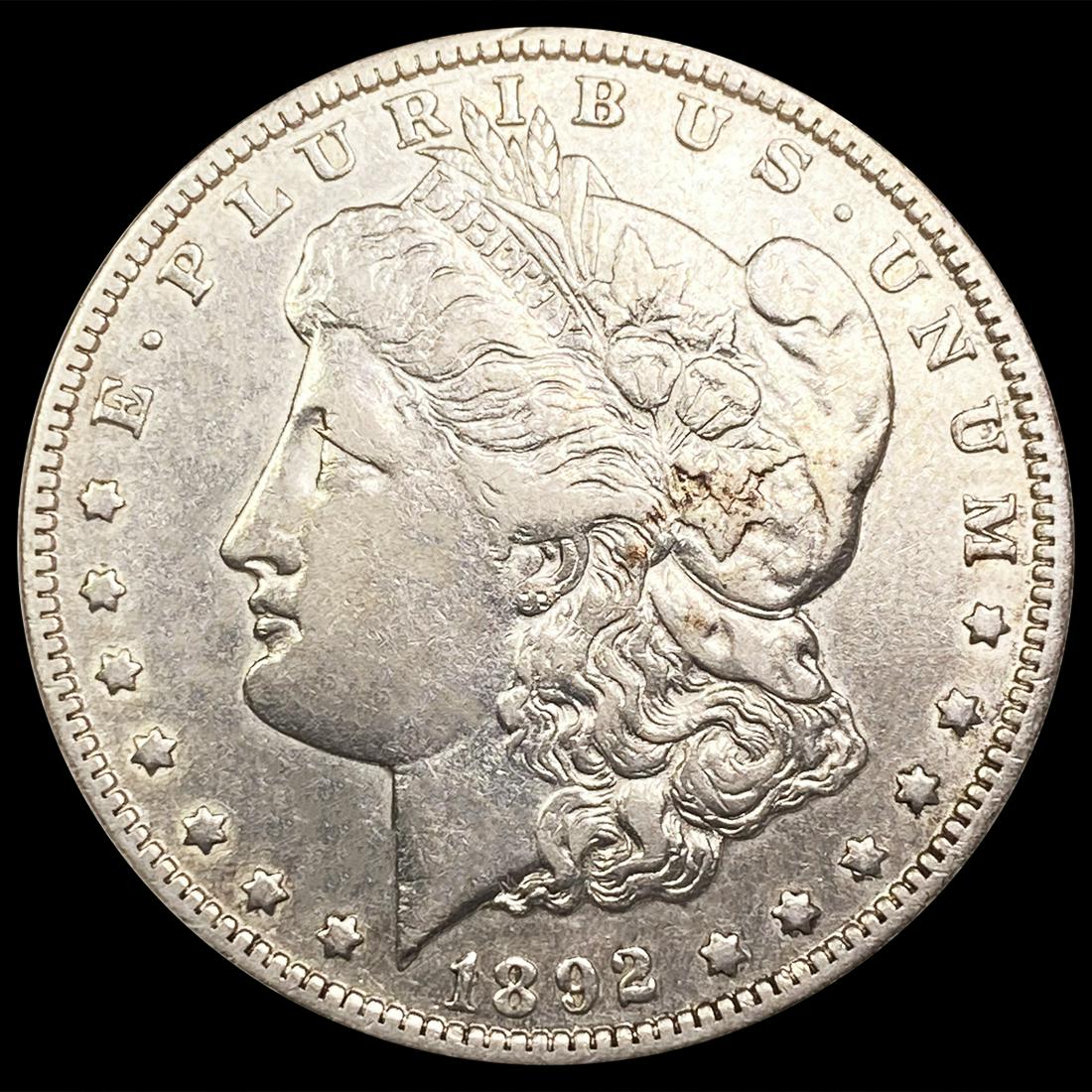 1892-O Morgan Silver Dollar NEARLY UNCIRCULATED (1 of 2)