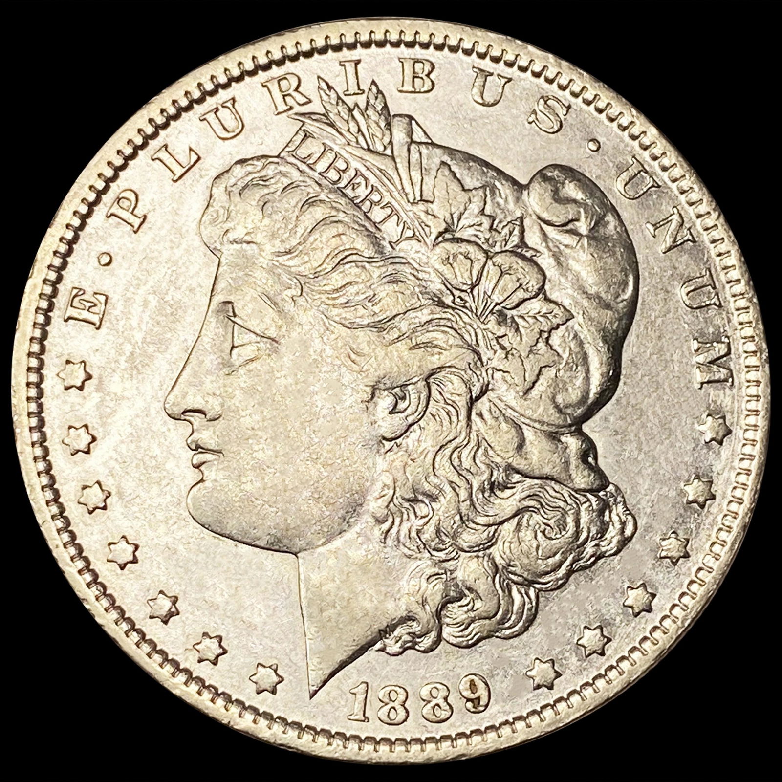 1889-O Morgan Silver Dollar NEARLY UNCIRCULATED (1 of 2)