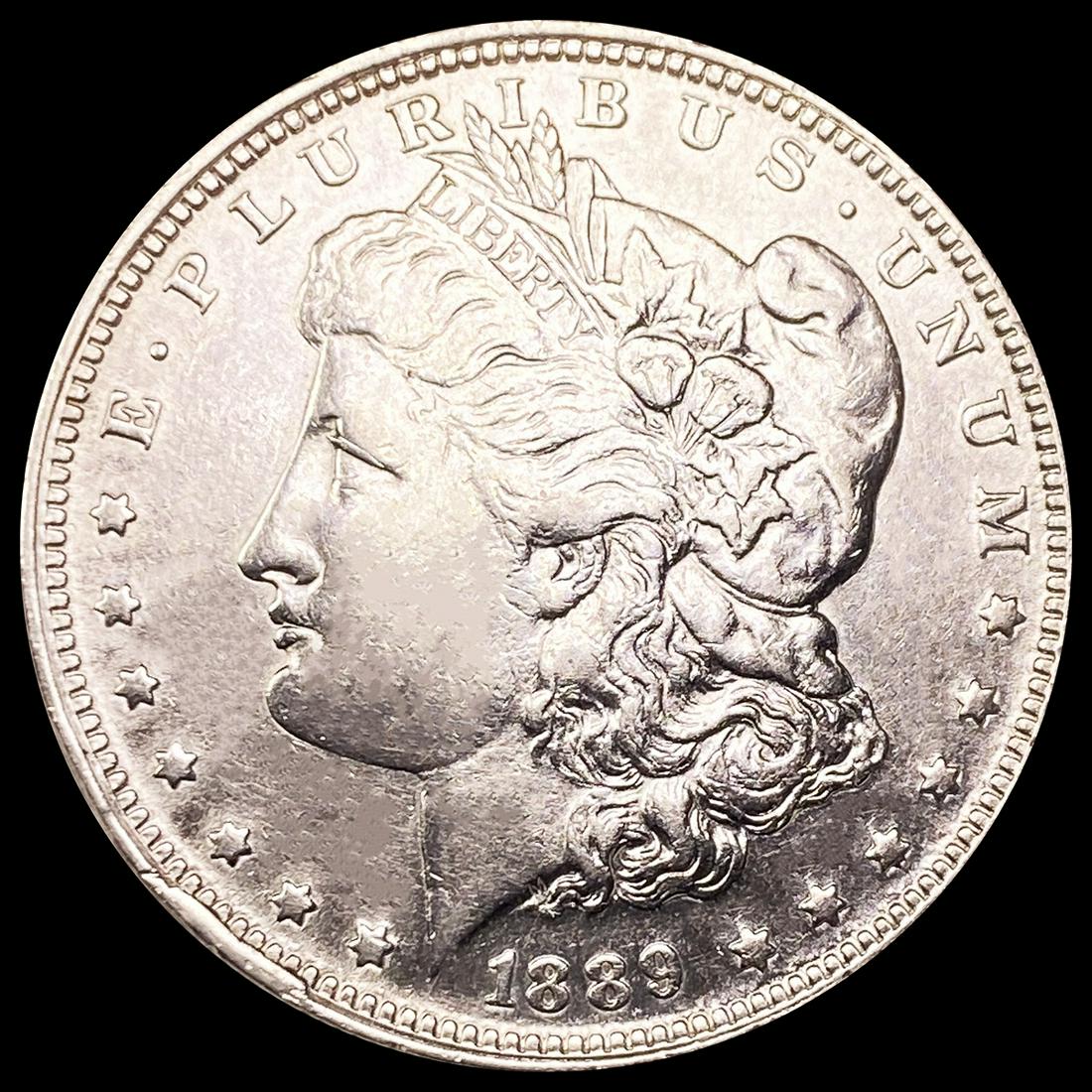 1889-O Morgan Silver Dollar NEARLY UNCIRCULATED (1 of 2)
