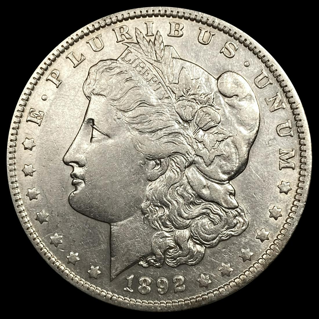 1892-O Morgan Silver Dollar NEARLY UNCIRCULATED (1 of 2)