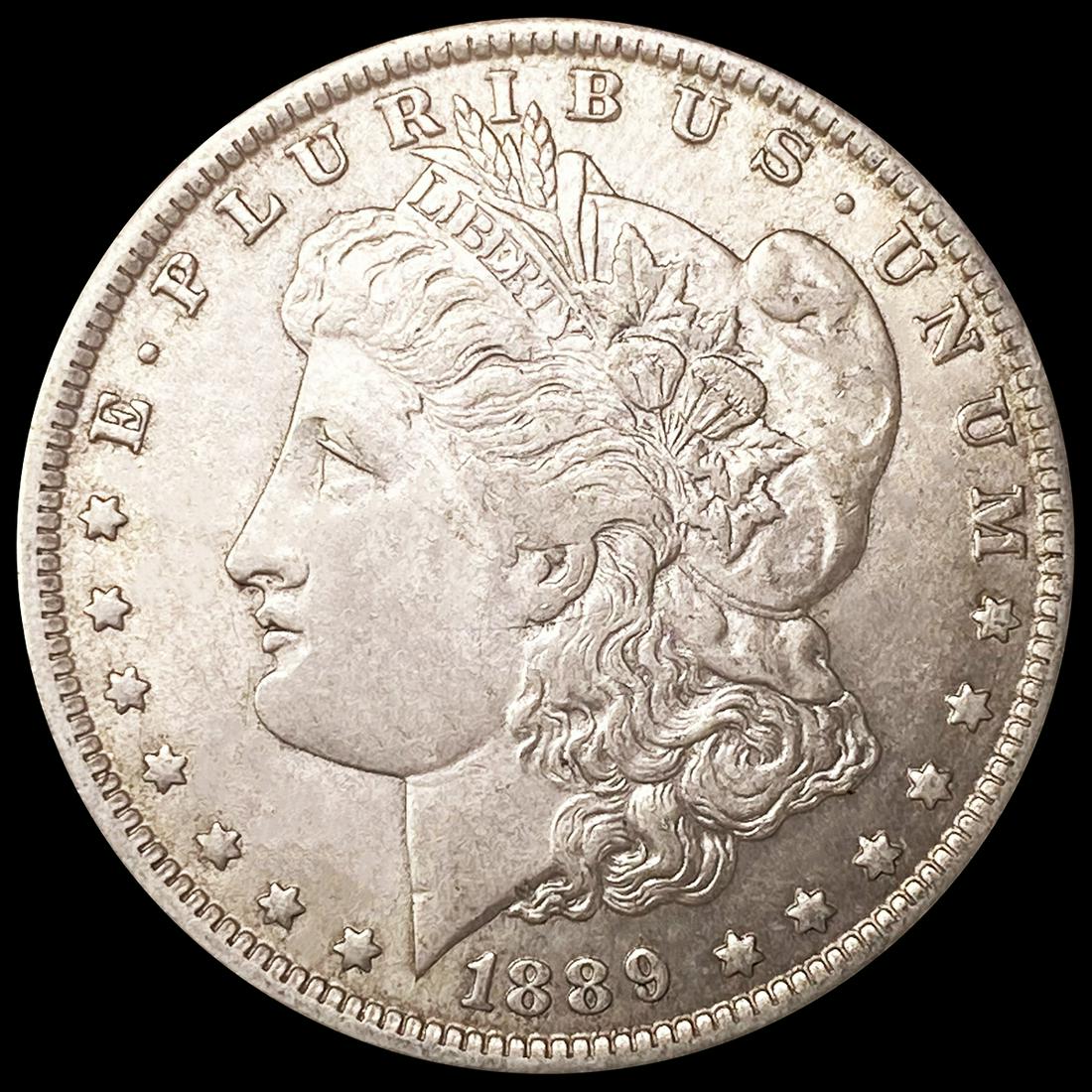 1889-O Morgan Silver Dollar NEARLY UNCIRCULATED (1 of 2)