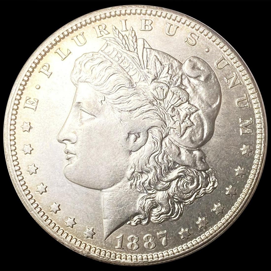 1887-O Morgan Silver Dollar CLOSELY UNCIRCULATED (1 of 2)