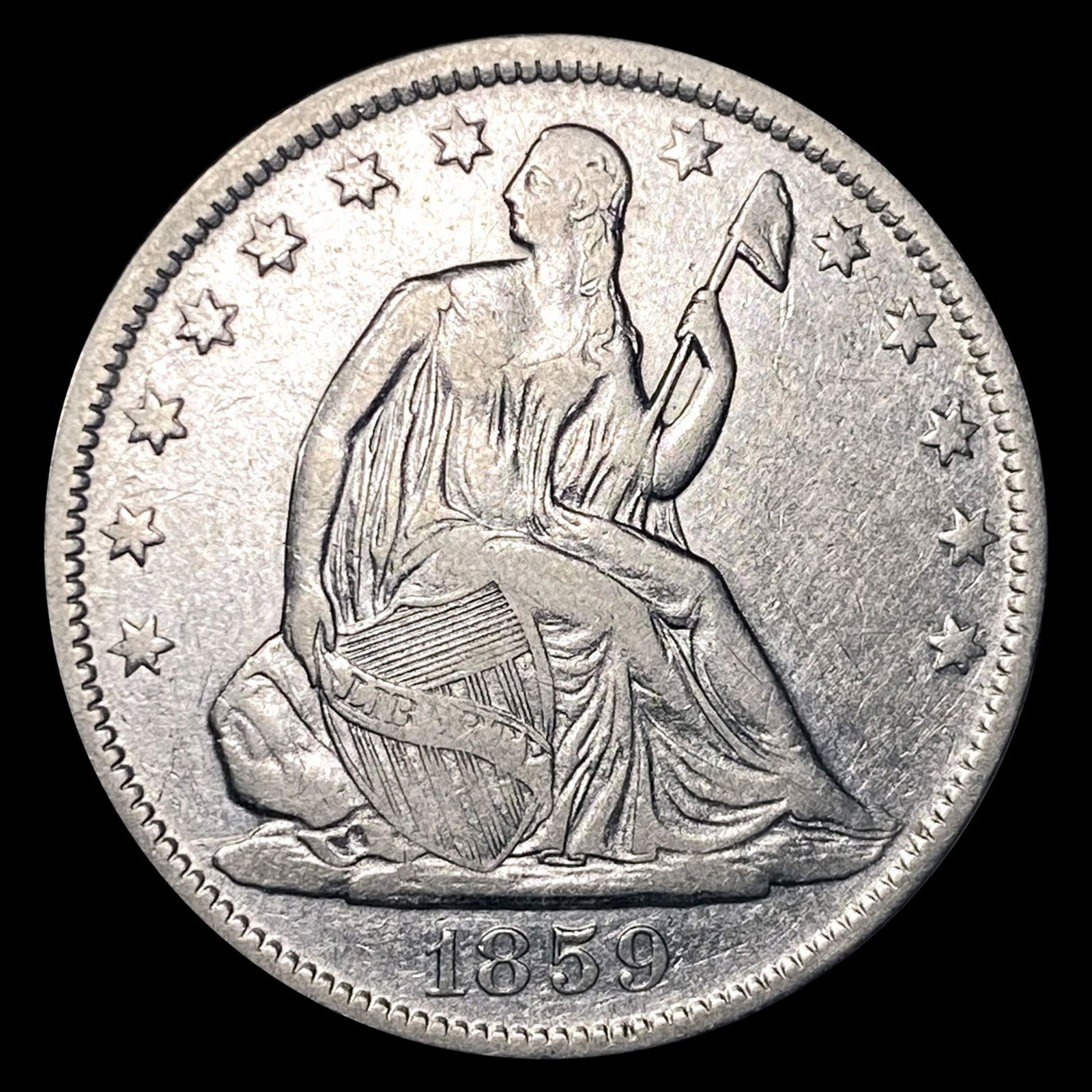 1859-O Seated Liberty Half Dollar CLOSELY (1 of 2)