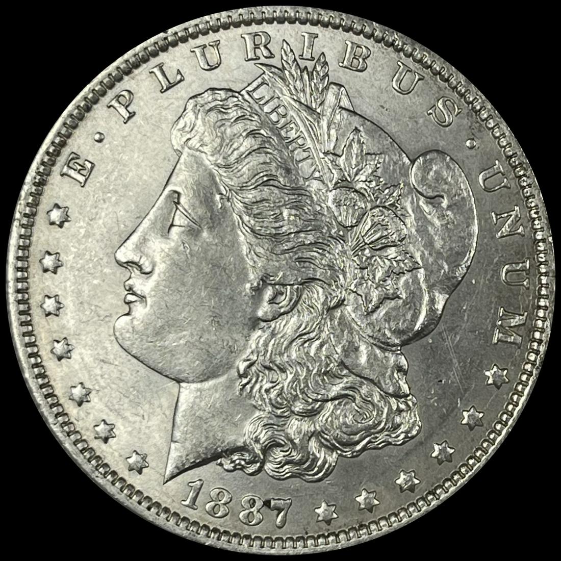 1887-O Morgan Silver Dollar UNCIRCULATED (1 of 2)
