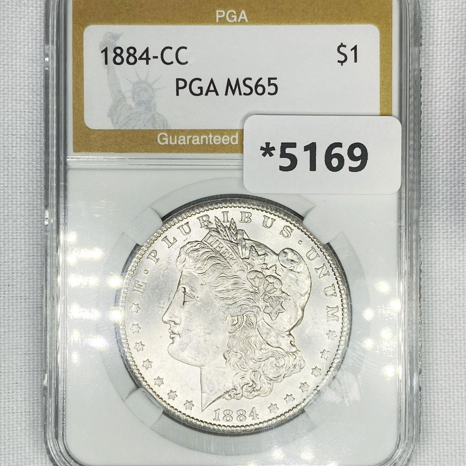 1884-CC Morgan Silver Dollar PGA-MS65 (1 of 2)