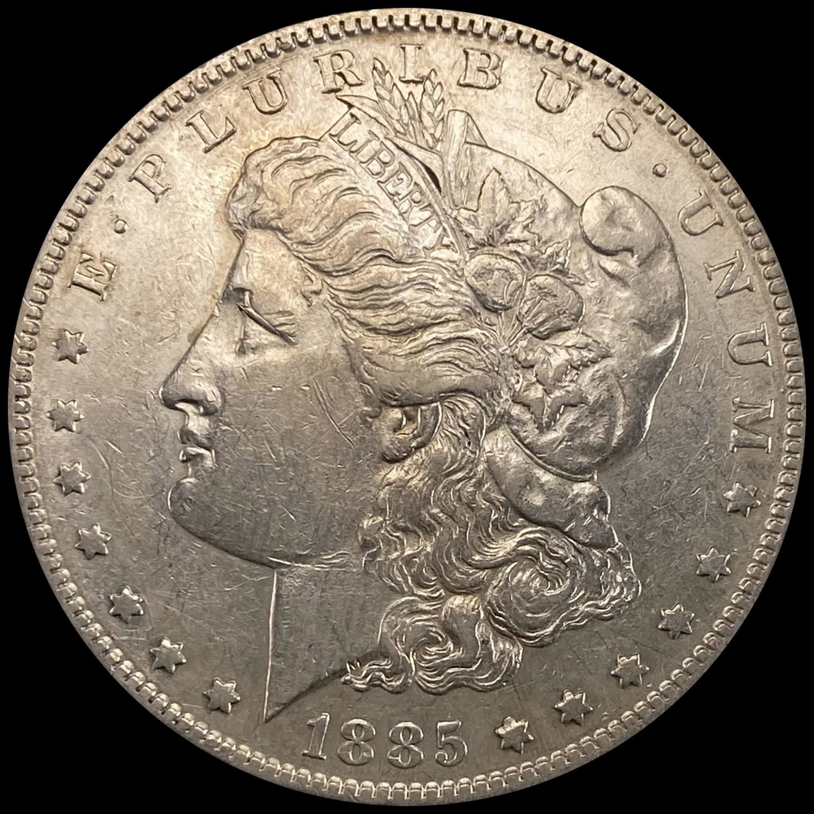 1885-S Morgan Silver Dollar CLOSELY UNCIRCULATED (1 of 2)