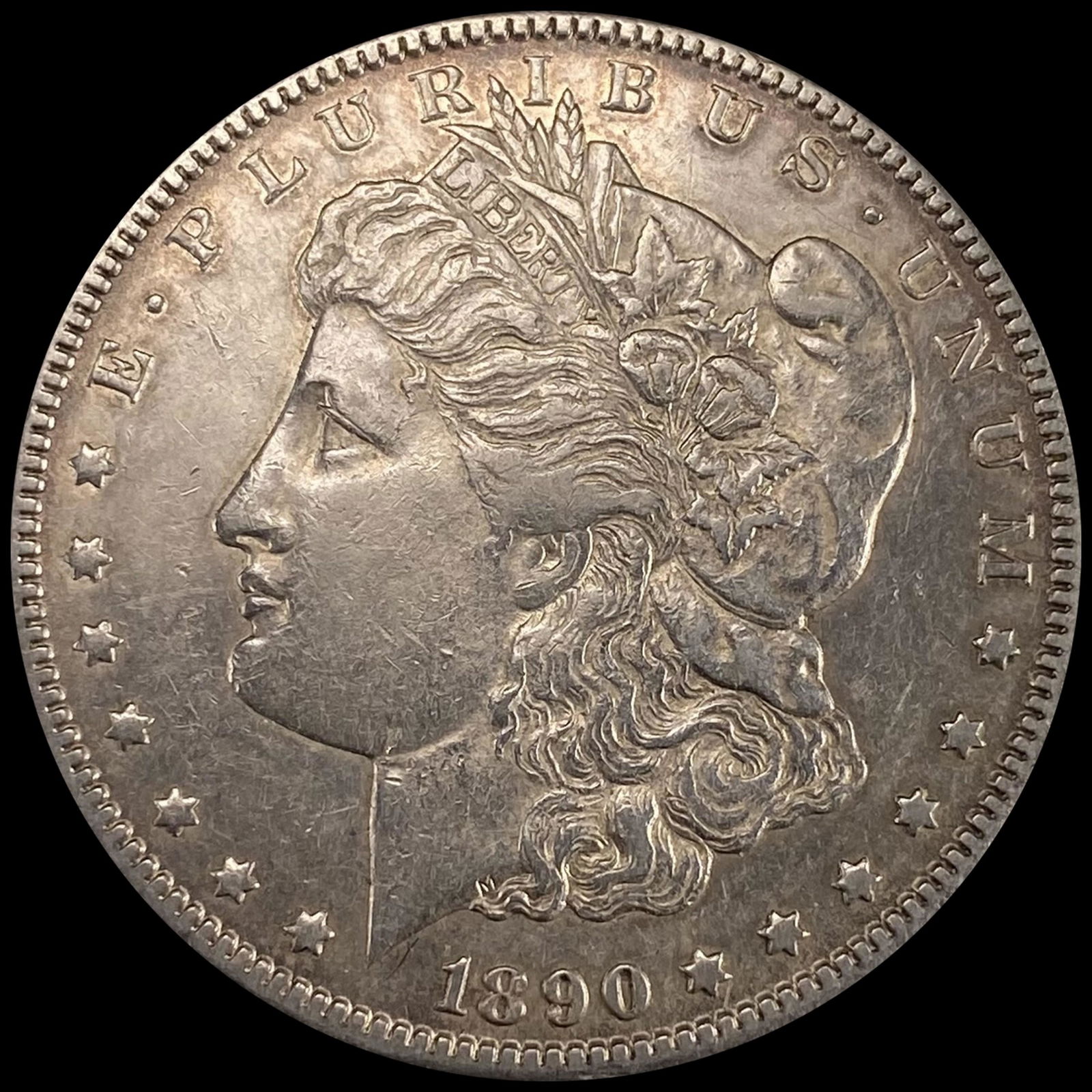 1890-CC Morgan Silver Dollar NEARLY UNCIRCULATED (1 of 2)