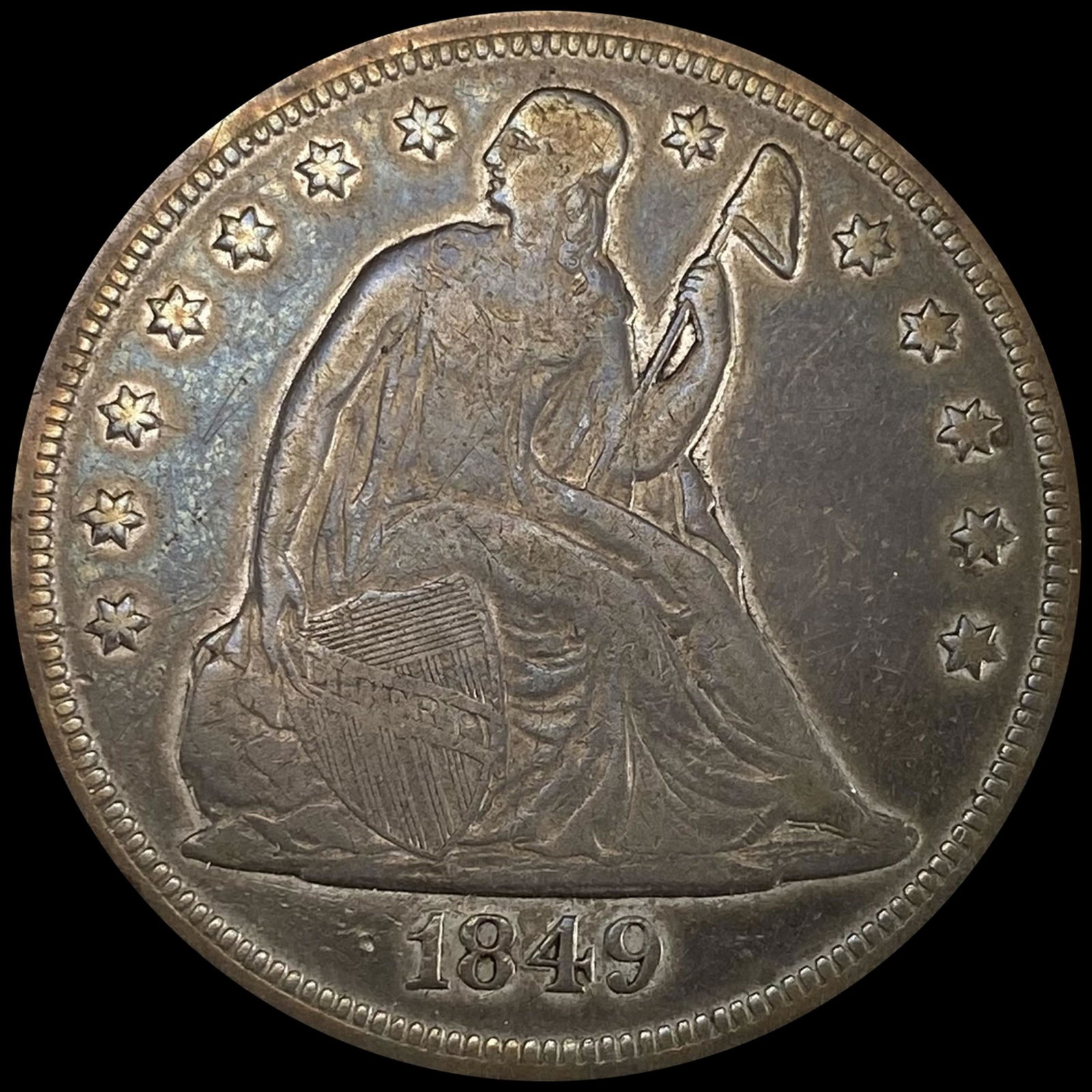 1849 Seated Liberty Dollar NEARLY UNCIRCULATED (1 of 2)