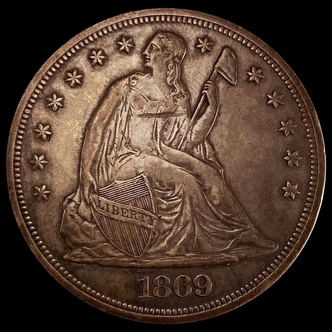 1869 Seated Liberty Dollar CLOSELY UNCIRCULATED (1 of 2)