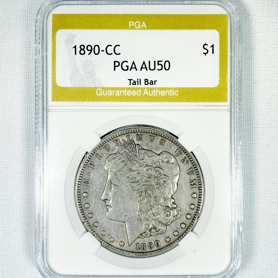 1890-CC Morgan Silver Dollar PGA-AU50 Tail Bar (1 of 2)