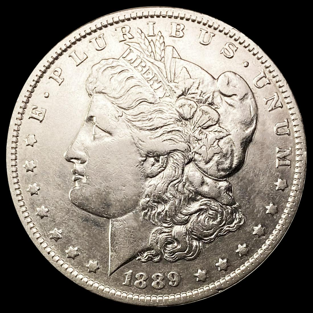 1889-O Morgan Silver Dollar NEARLY UNCIRCULATED (1 of 2)