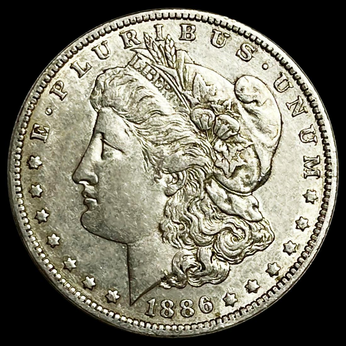 1886-O Morgan Silver Dollar CLOSELY UNCIRCULATED (1 of 2)