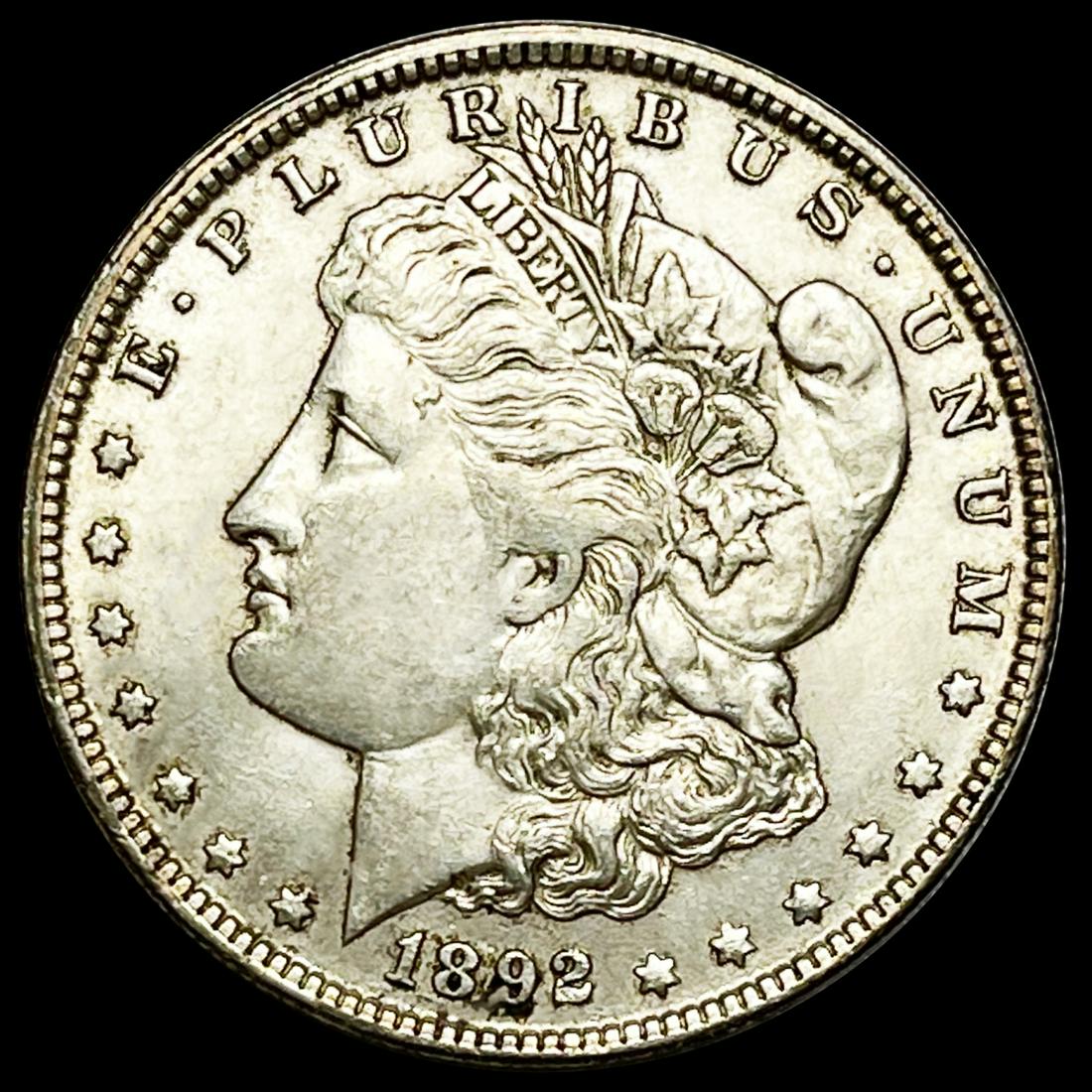 1892-O Morgan Silver Dollar NEARLY UNCIRCULATED (1 of 2)