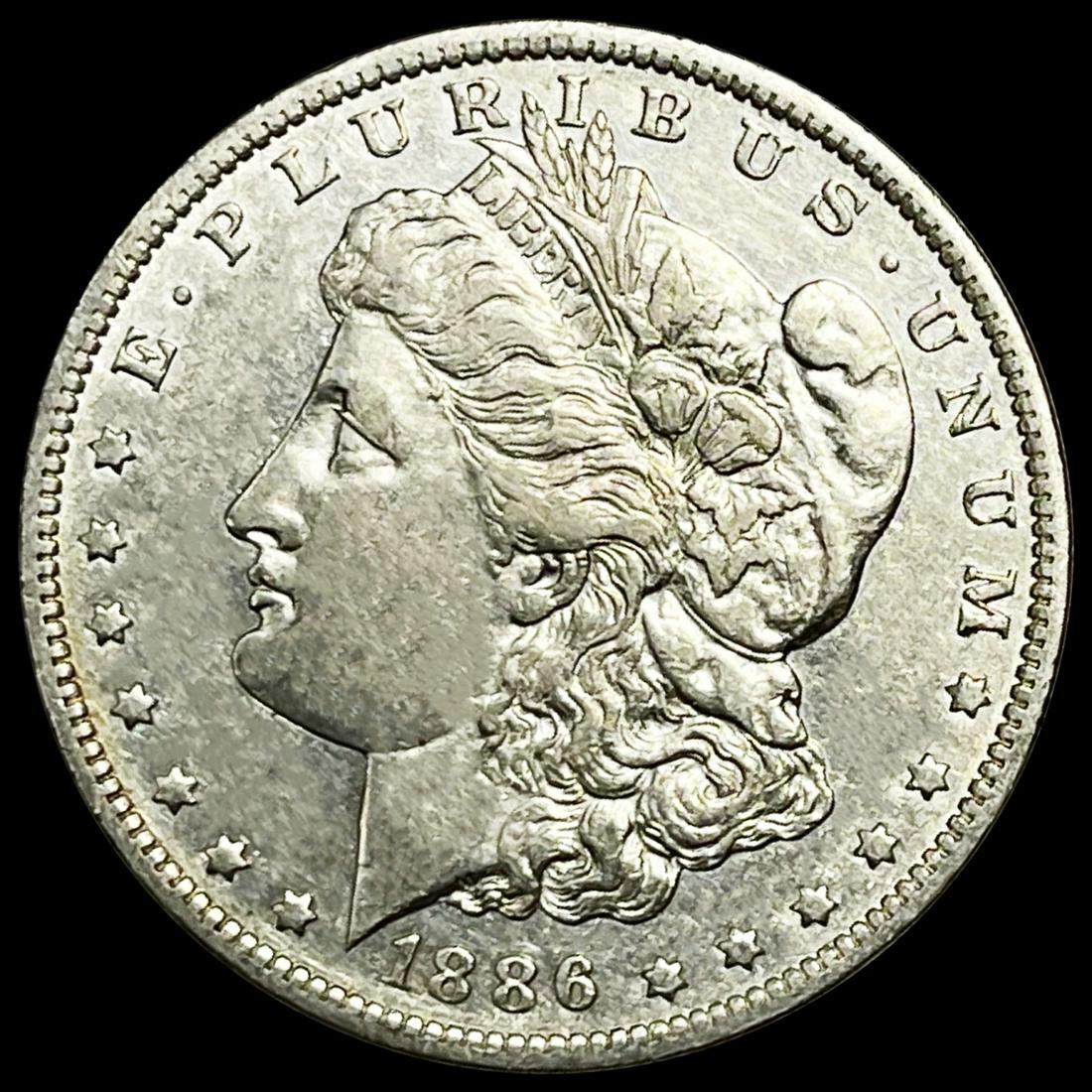 1886-O Morgan Silver Dollar CLOSELY UNCIRCULATED (1 of 2)