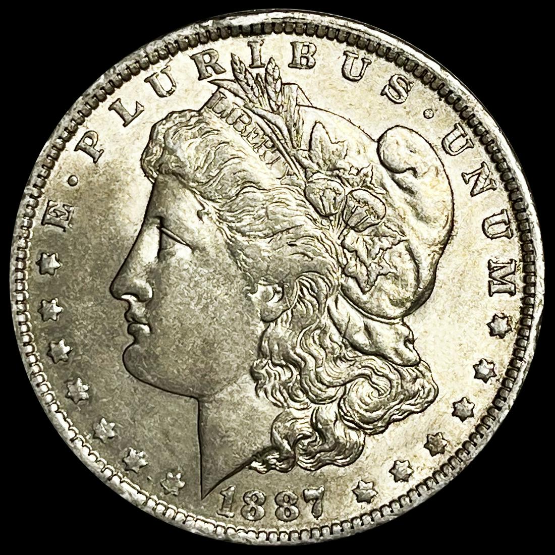 1887-O Morgan Silver Dollar CLOSELY UNCIRCULATED (1 of 2)