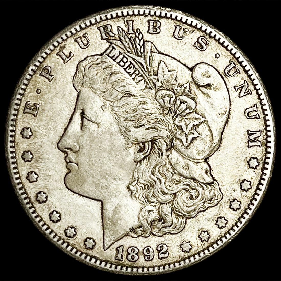 1892-CC Morgan Silver Dollar NEARLY UNCIRCULATED (1 of 2)
