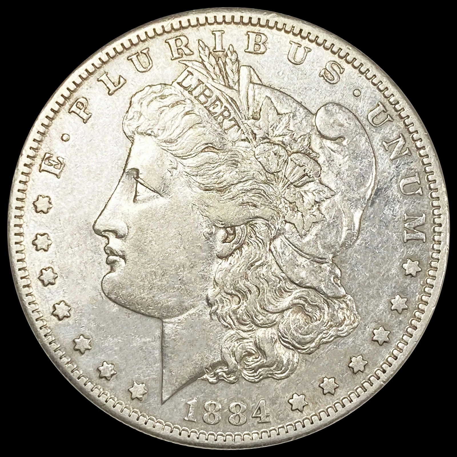 1884-S Morgan Silver Dollar CLOSELY UNCIRCULATED (1 of 2)
