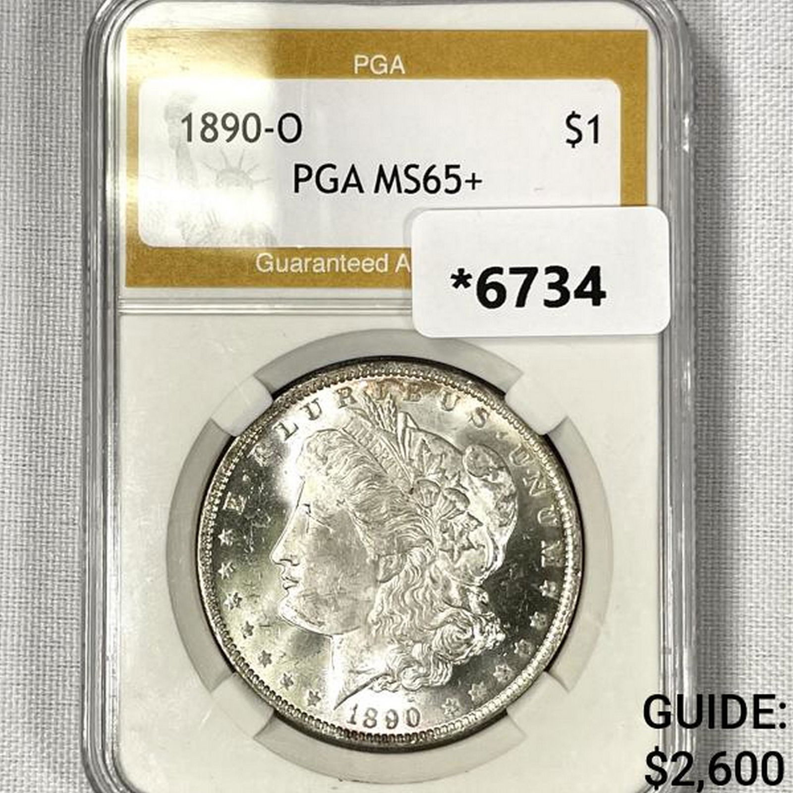 1890-O Morgan Silver Dollar PGA-MS65+ (1 of 2)