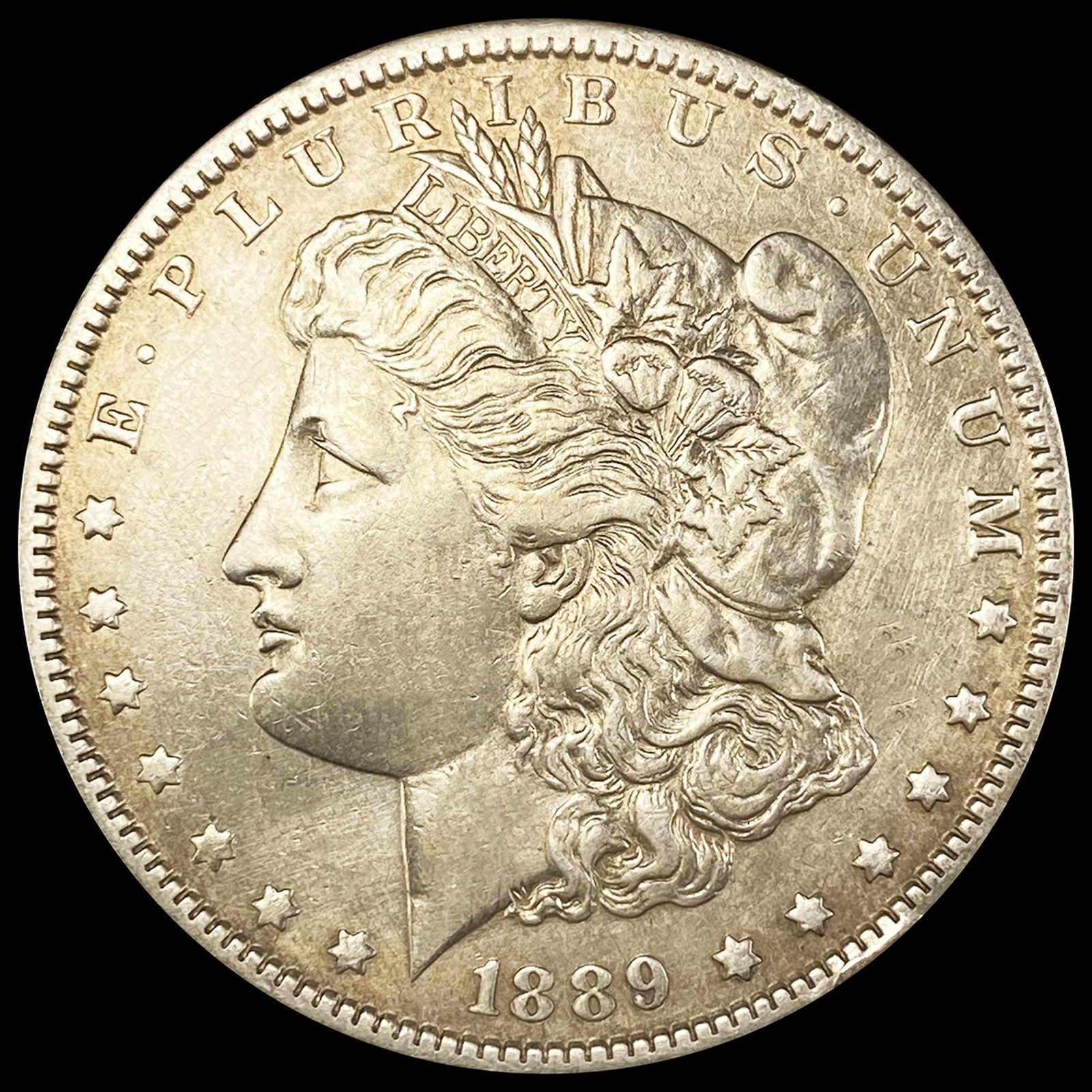 1889-O Morgan Silver Dollar NEARLY UNCIRCULATED (1 of 2)