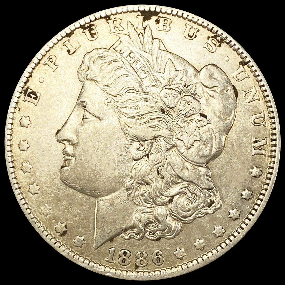 1886-O Morgan Silver Dollar NEARLY UNCIRCULATED (1 of 2)