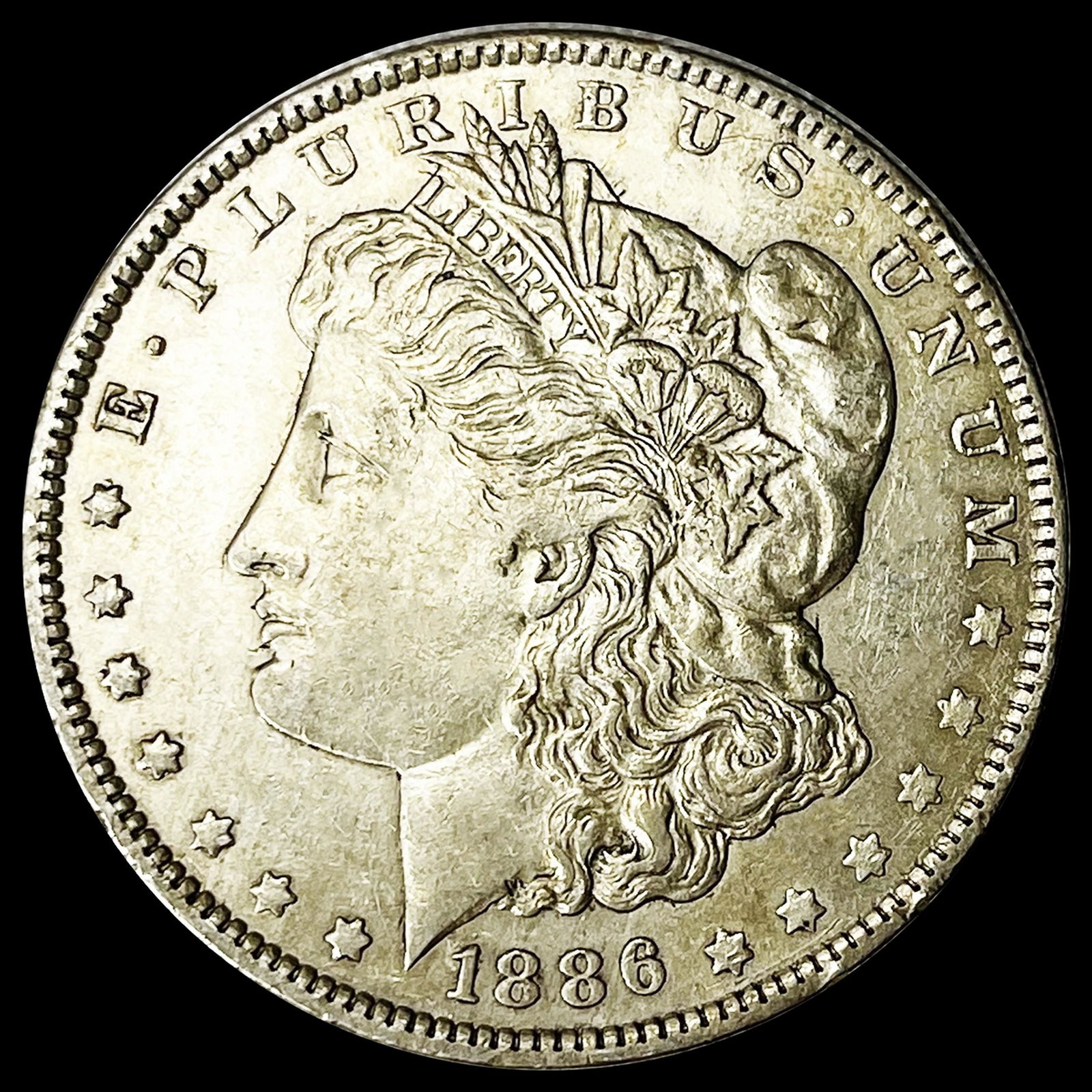 1886-O Morgan Silver Dollar NEARLY UNCIRCULATED (1 of 2)