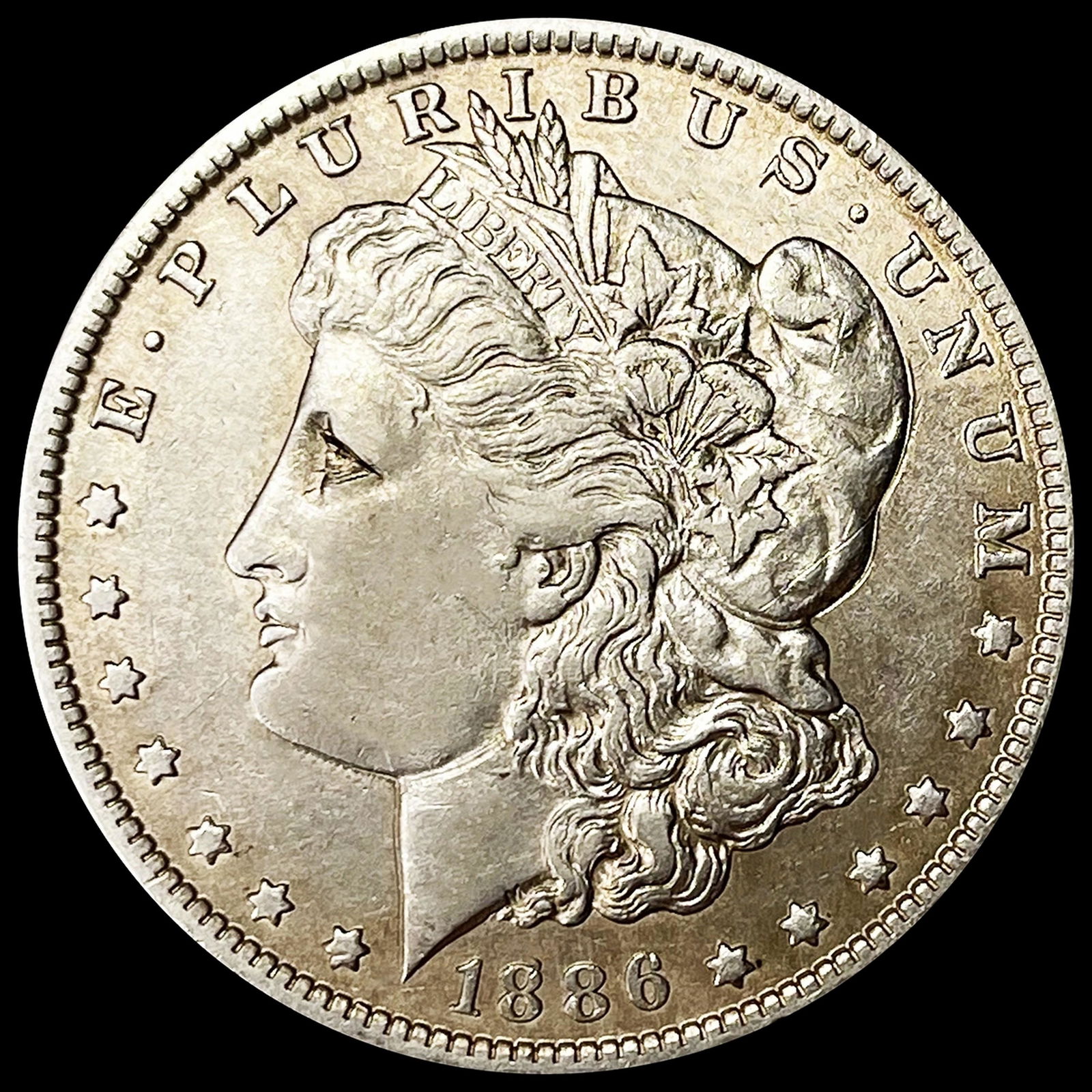 1886-O Morgan Silver Dollar NEARLY UNCIRCULATED (1 of 2)