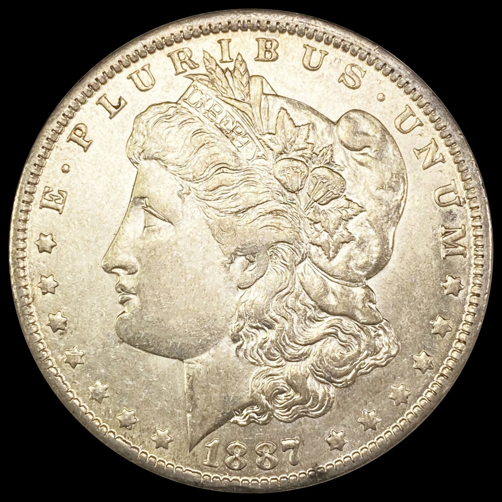 1887-O Morgan Silver Dollar CLOSELY UNCIRCULATED (1 of 2)