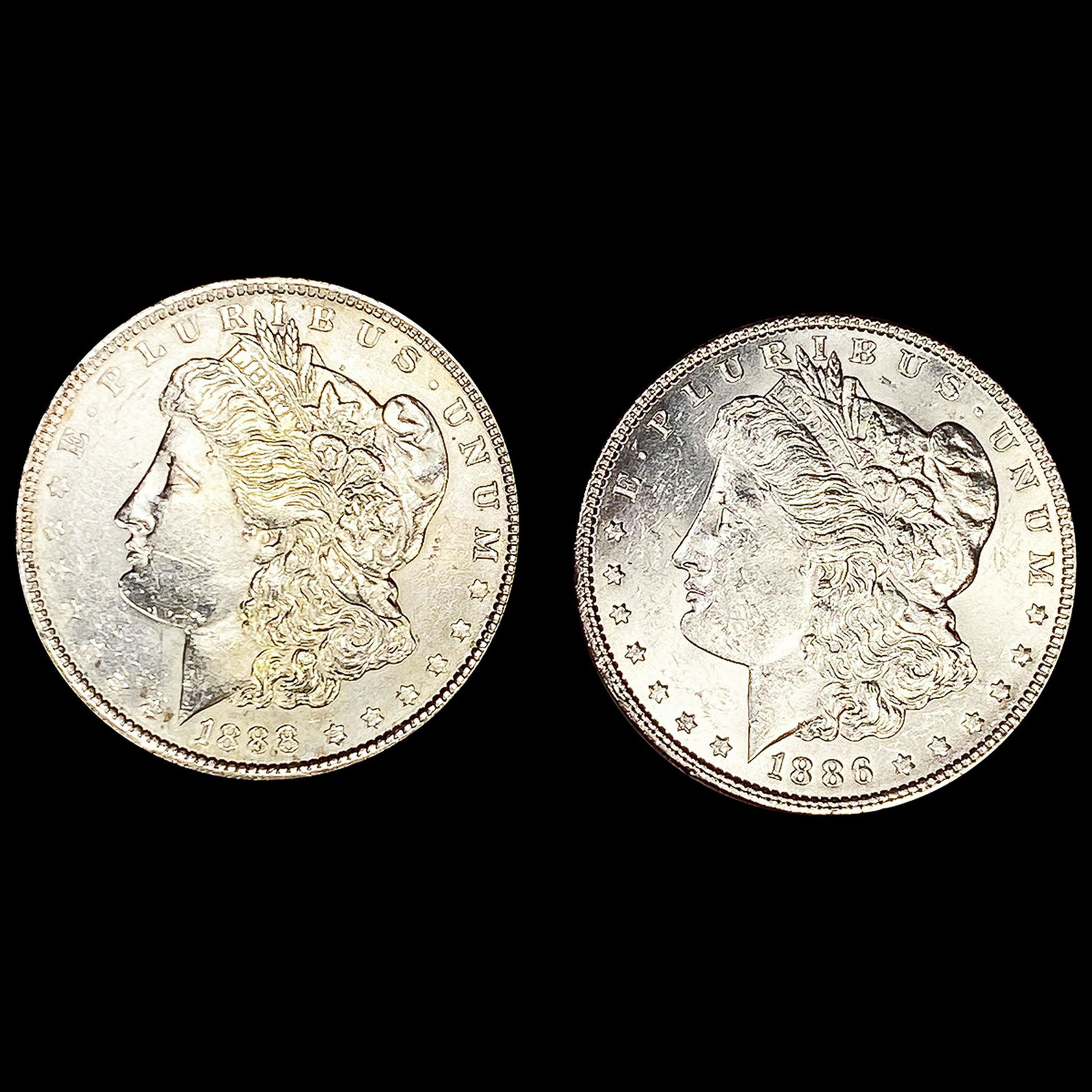(2) Morgan Silver Dollars (1886, 1888) UNC (1 of 2)