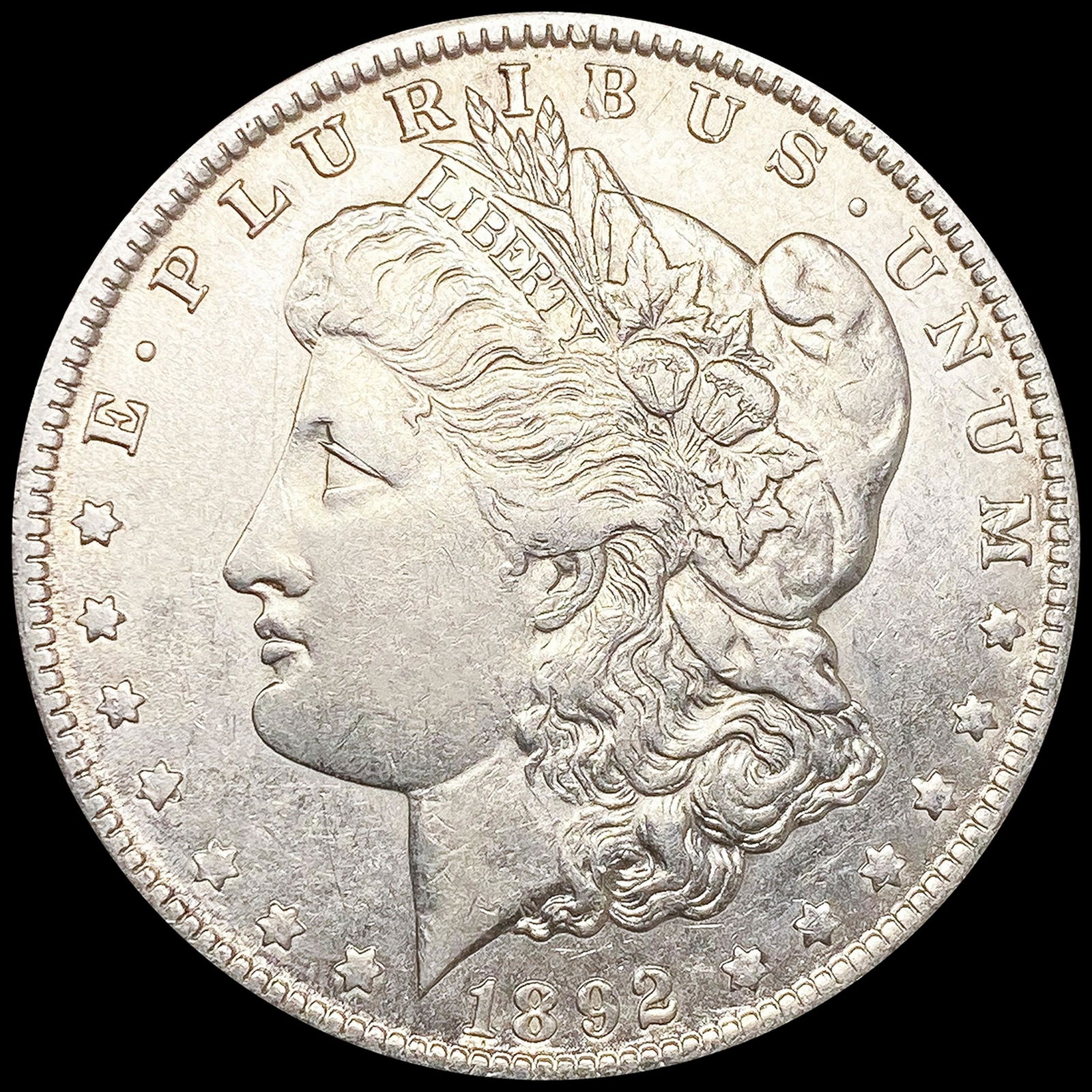1892-O Morgan Silver Dollar NEARLY UNCIRCULATED (1 of 2)