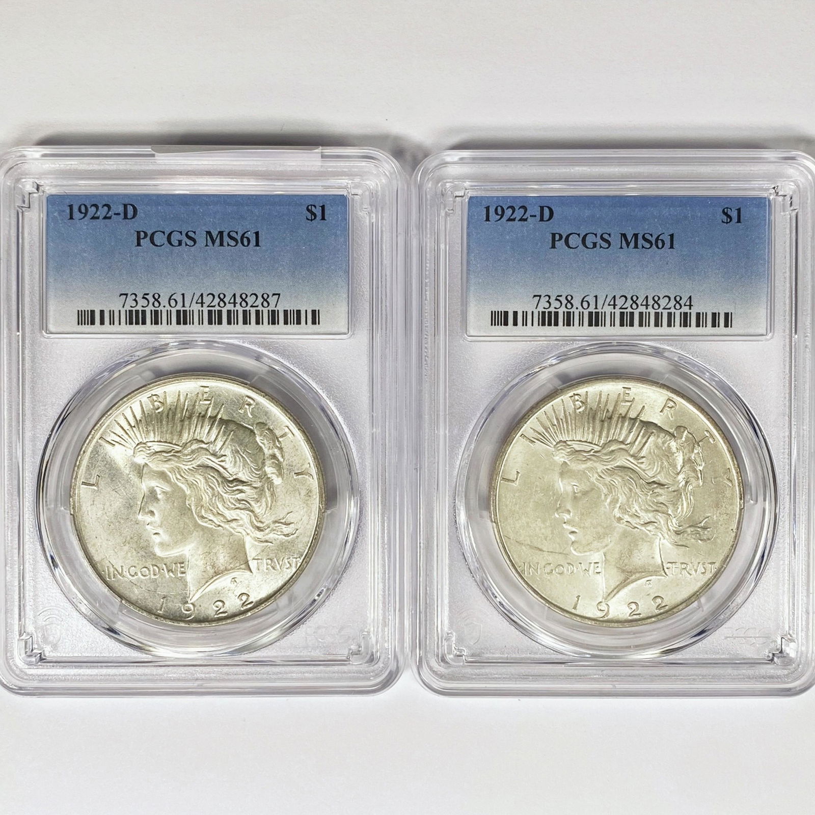 1922-D Set (2) Silver Peace Dollar PCGS MS61 (1 of 2)