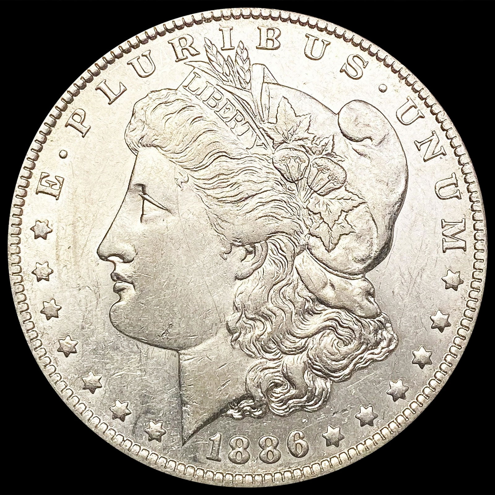 1886-O Morgan Silver Dollar CLOSELY UNCIRCULATED (1 of 2)