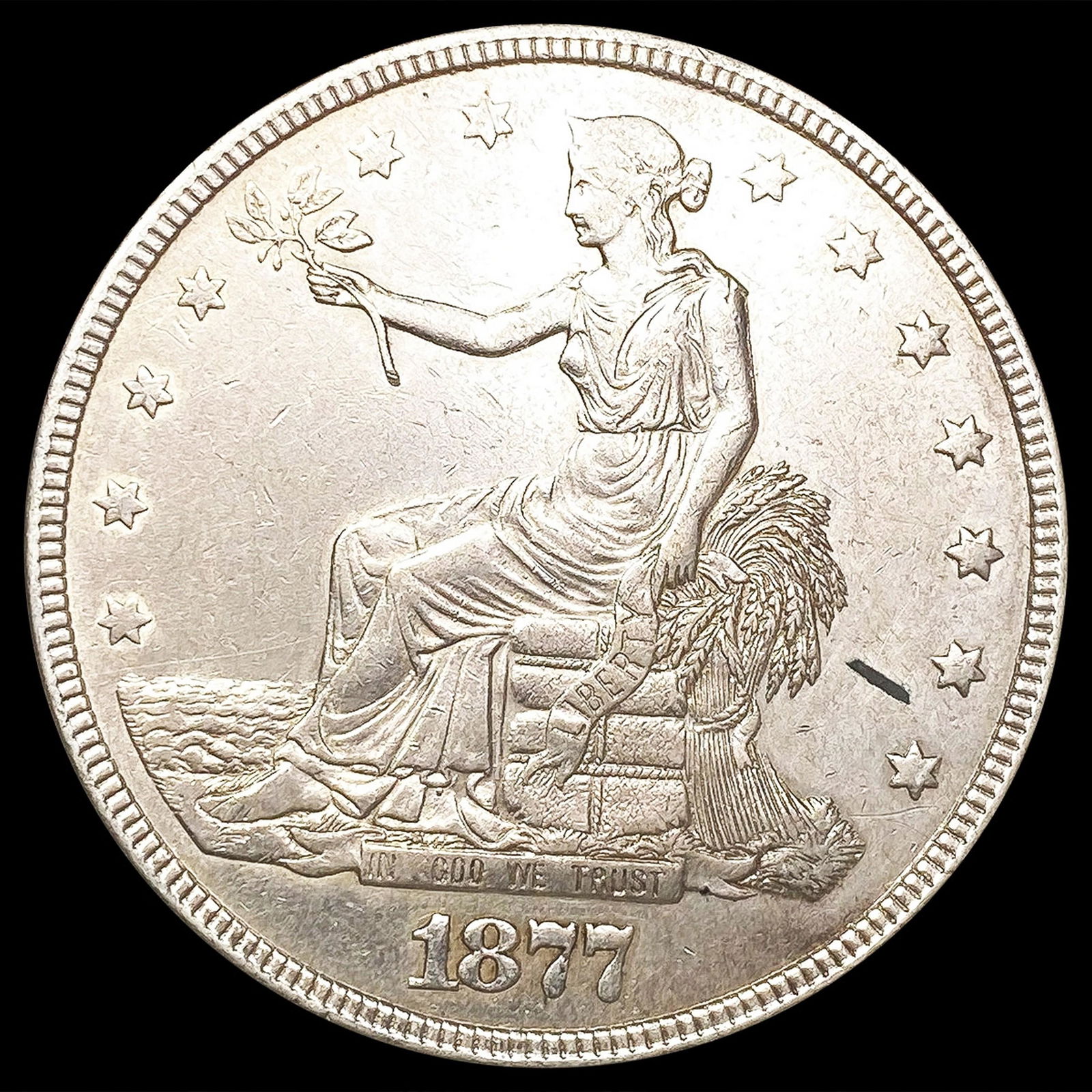 1877 Silver Trade Dollar CLOSELY UNCIRCULATED (1 of 2)
