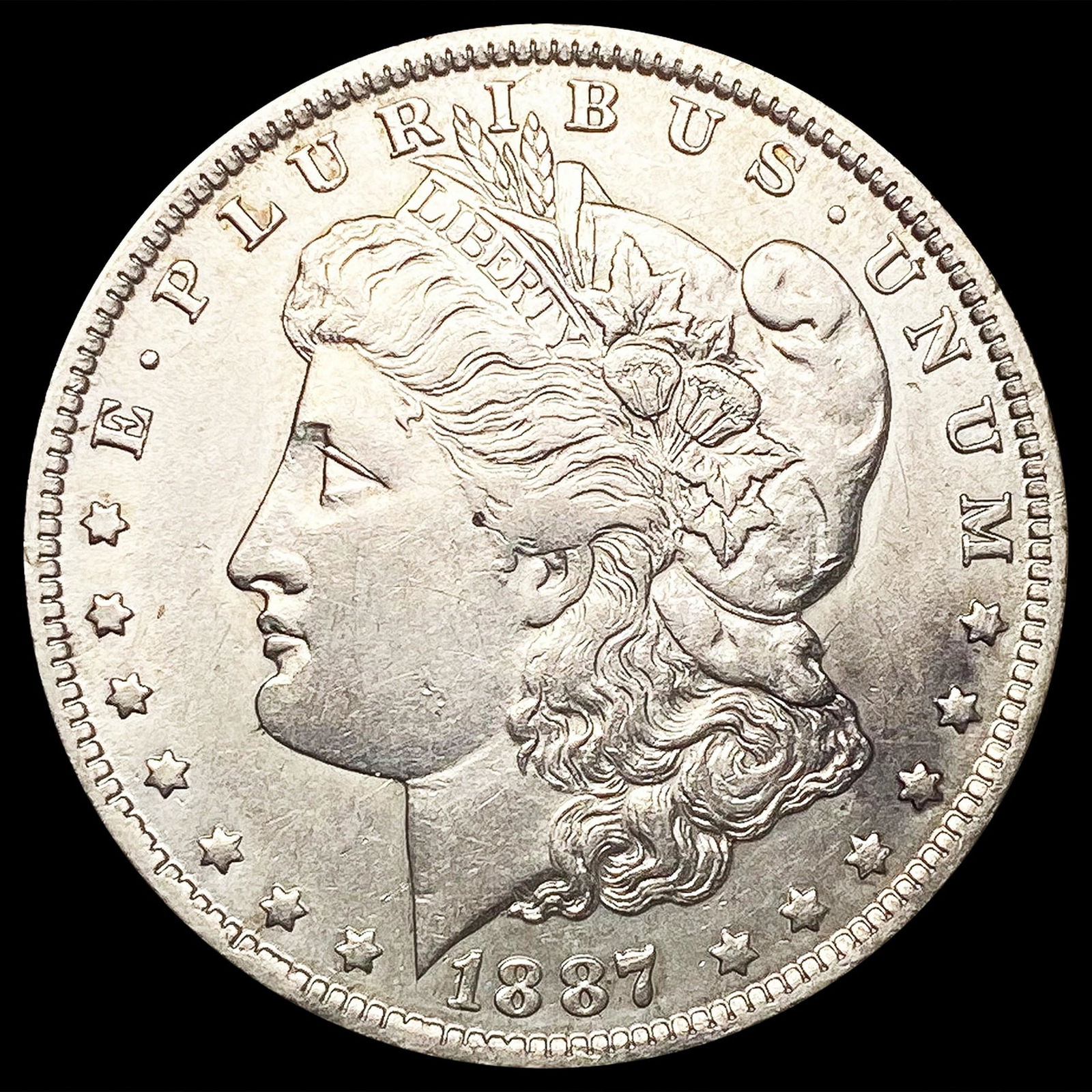 1887-O Morgan Silver Dollar CLOSELY UNCIRCULATED (1 of 2)