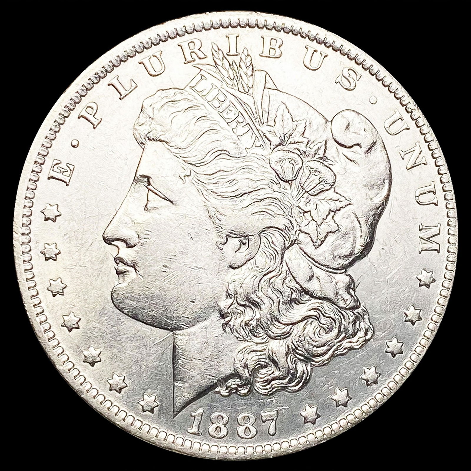 1887-O Morgan Silver Dollar CLOSELY UNCIRCULATED (1 of 2)