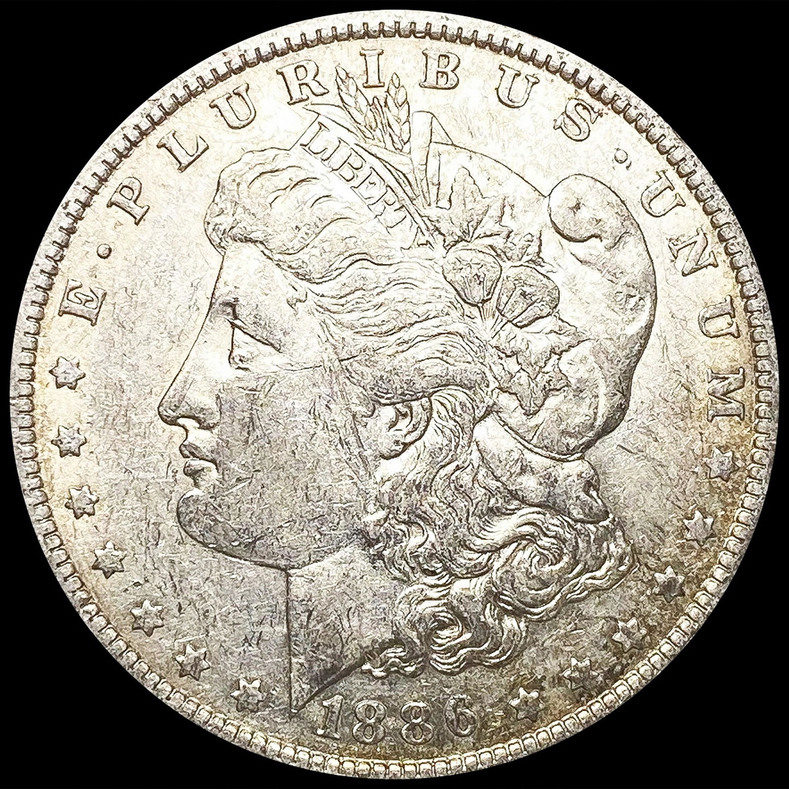 1886-O Morgan Silver Dollar NEARLY UNCIRCULATED (1 of 2)