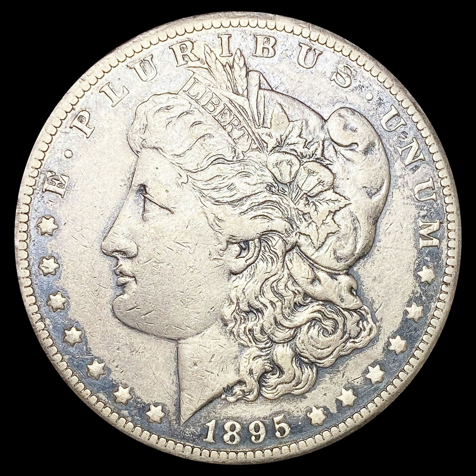 1895-O Morgan Silver Dollar NEARLY UNCIRCULATED (1 of 2)