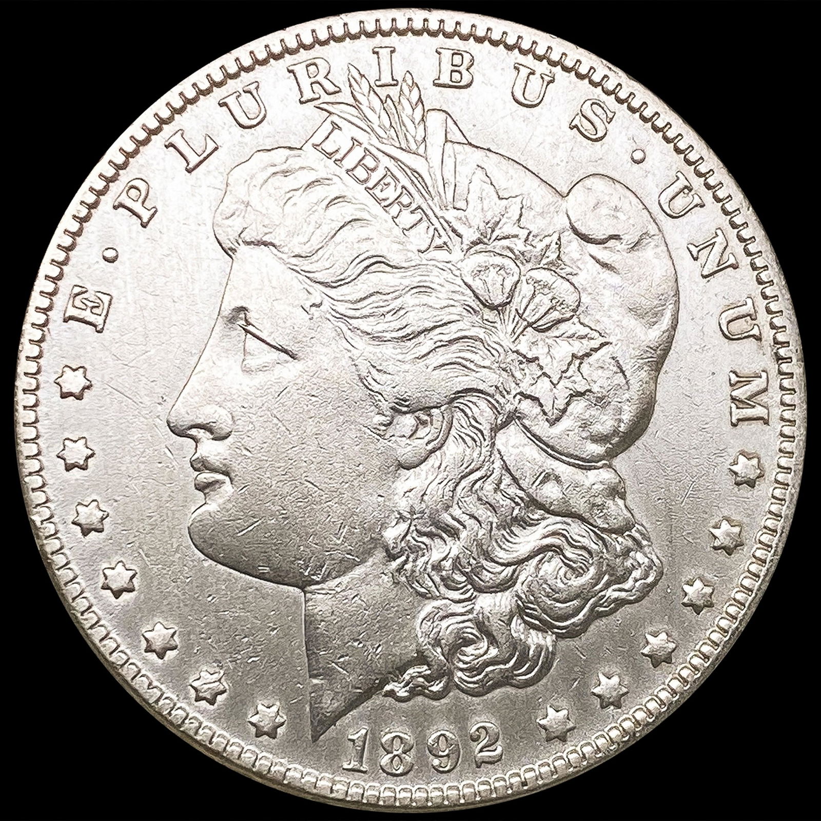 1892-O Morgan Silver Dollar NEARLY UNCIRCULATED (1 of 2)