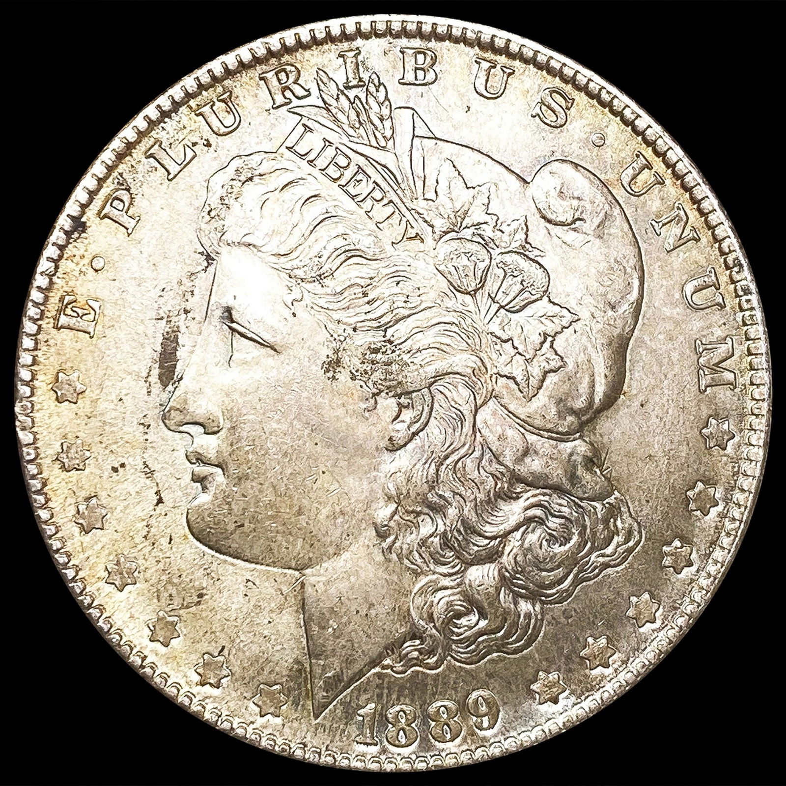 1889 Morgan Silver Dollar CLOSELY UNCIRCULATED (1 of 2)