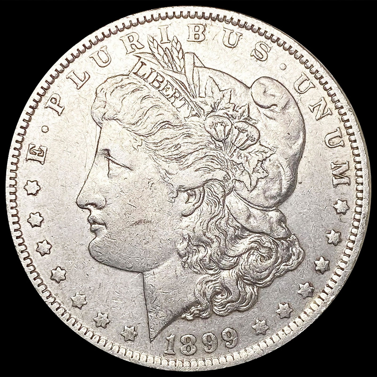 1899-O Morgan Silver Dollar CLOSELY UNCIRCULATED (1 of 2)