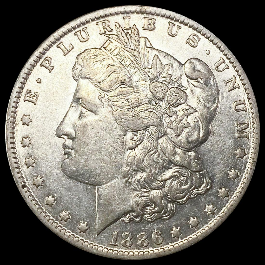 1886-O Morgan Silver Dollar NEARLY UNCIRCULATED (1 of 2)