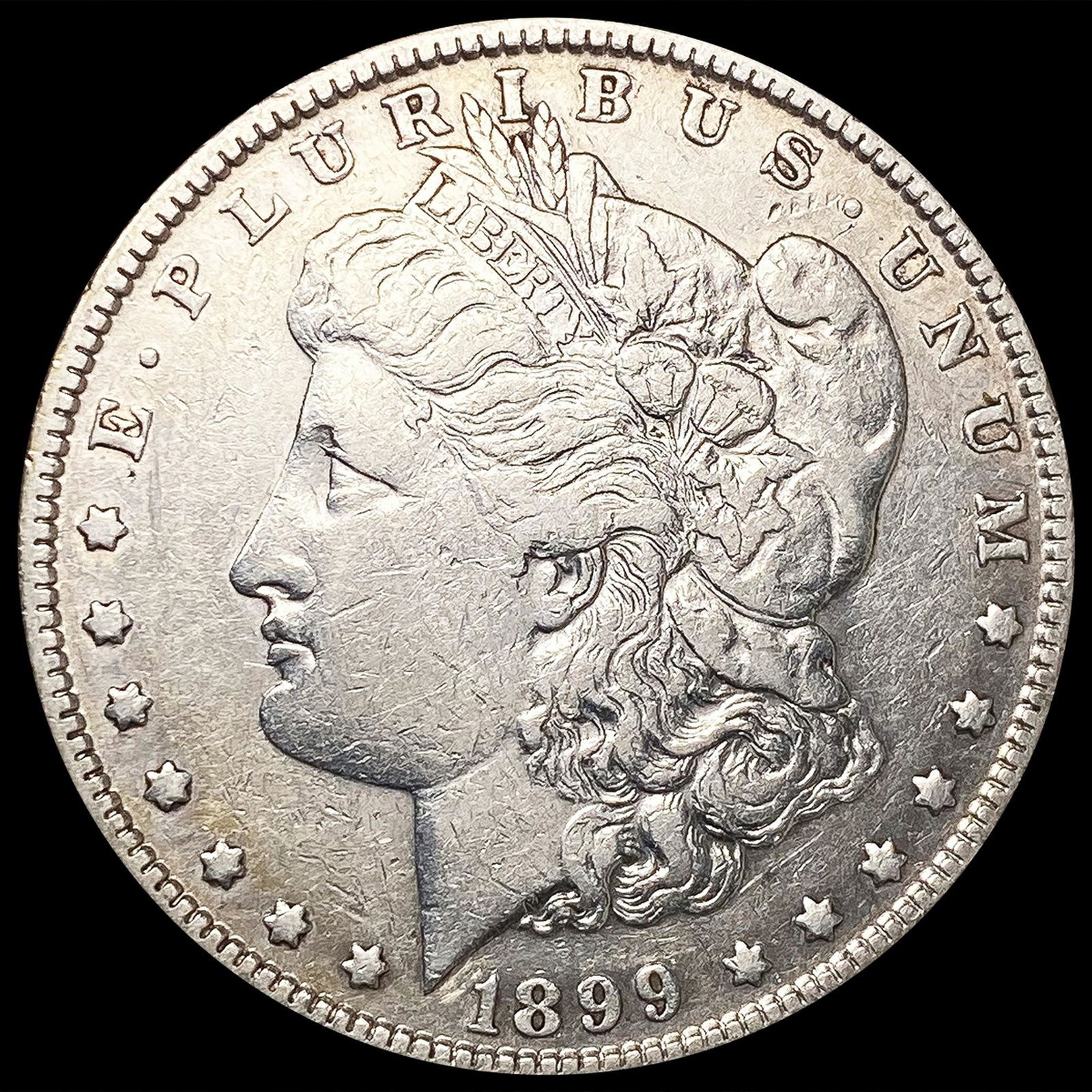 1899 Morgan Silver Dollar NEARLY UNCIRCULATED (1 of 2)