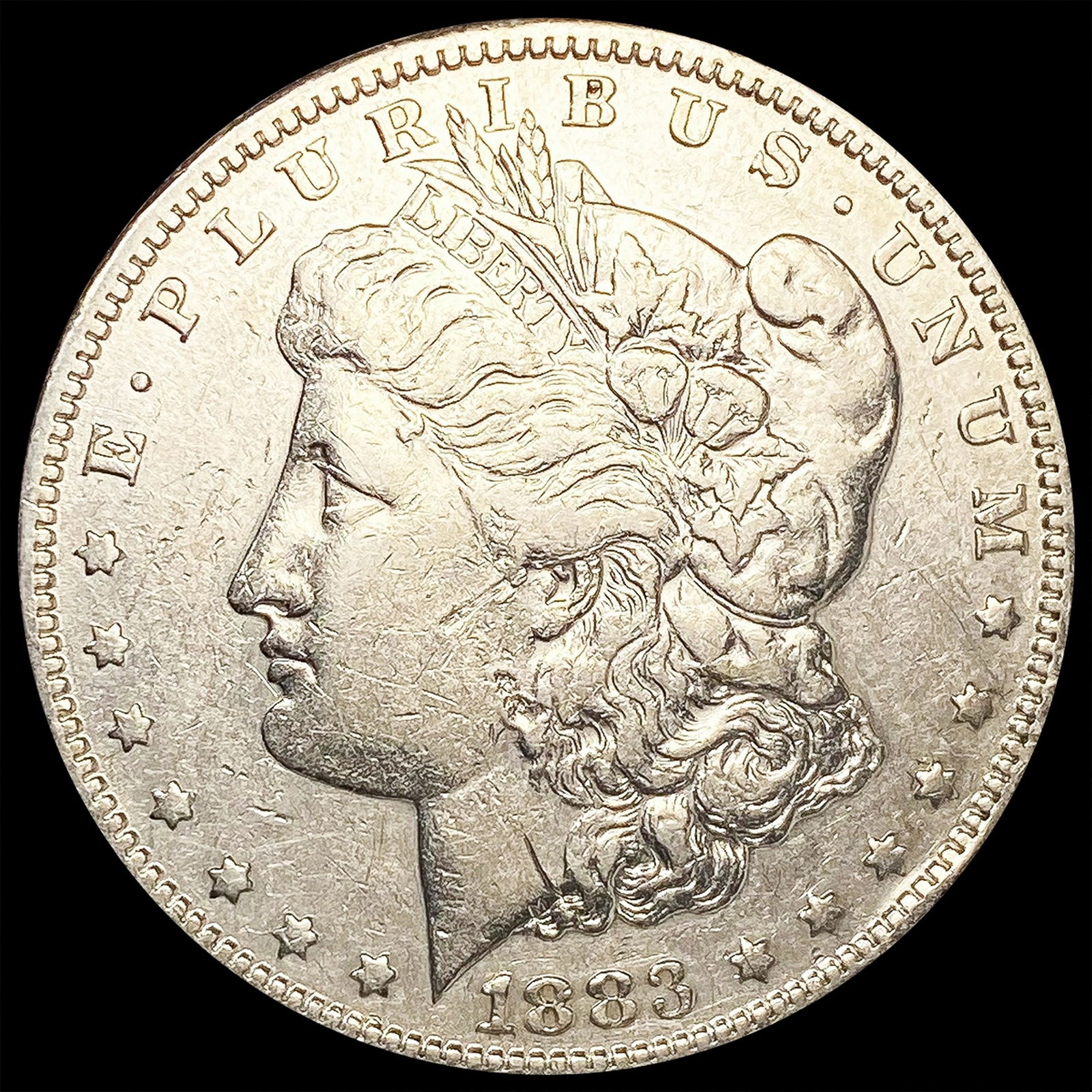 1883-S Morgan Silver Dollar NEARLY UNCIRCULATED (1 of 2)