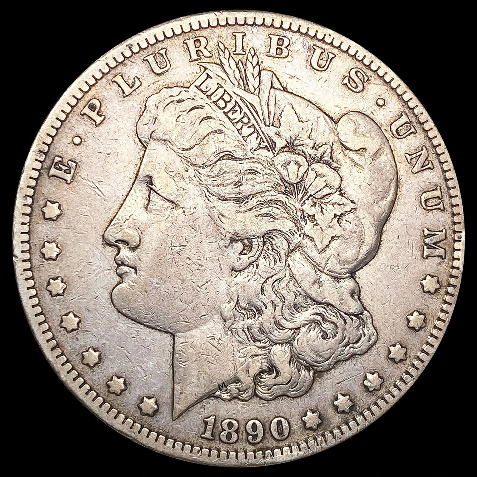 1890-CC Morgan Silver Dollar NEARLY UNCIRCULATED (1 of 2)