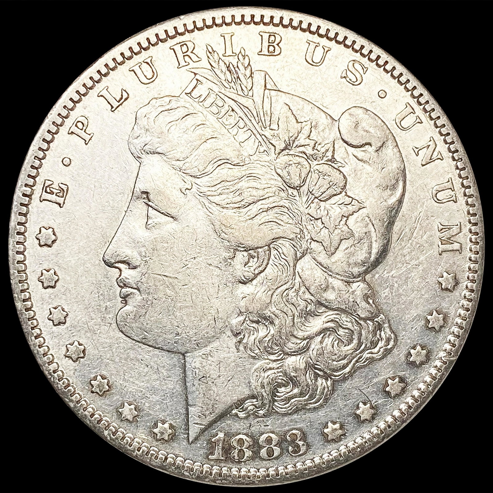 1883-S Morgan Silver Dollar CLOSELY UNCIRCULATED (1 of 2)