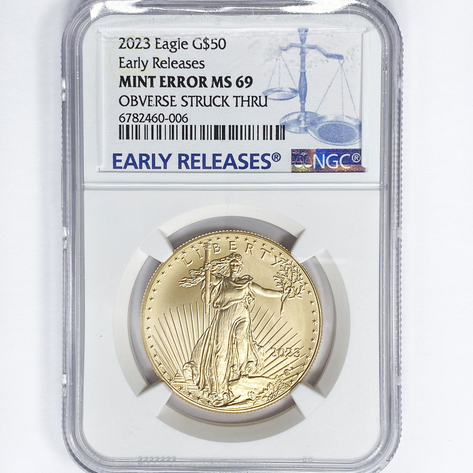 2023 $50 1oz AGE NGC MS69 Obv Struck Thru (1 of 2)