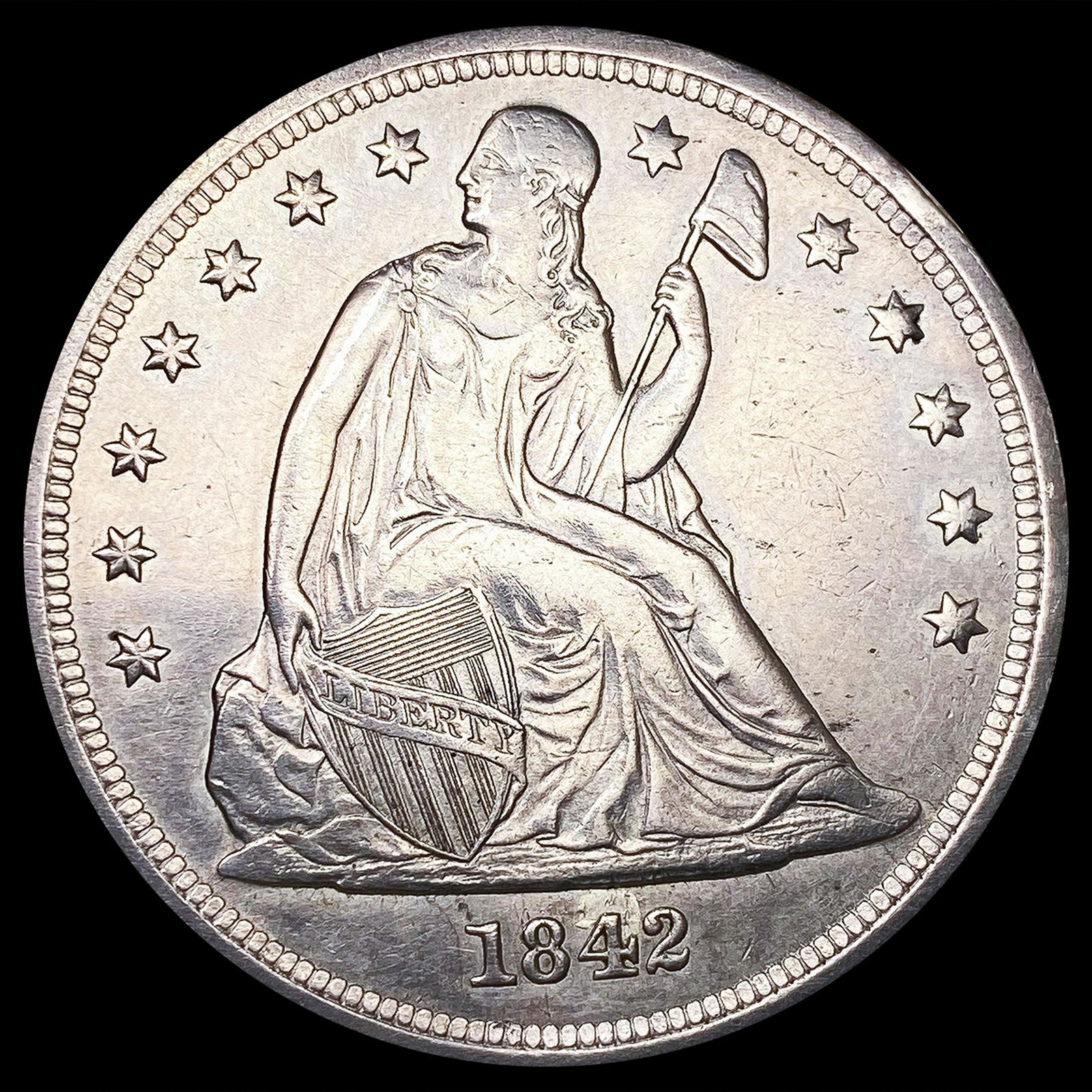 1842 Seated Liberty Dollar CLOSELY UNCIRCULATED (1 of 2)