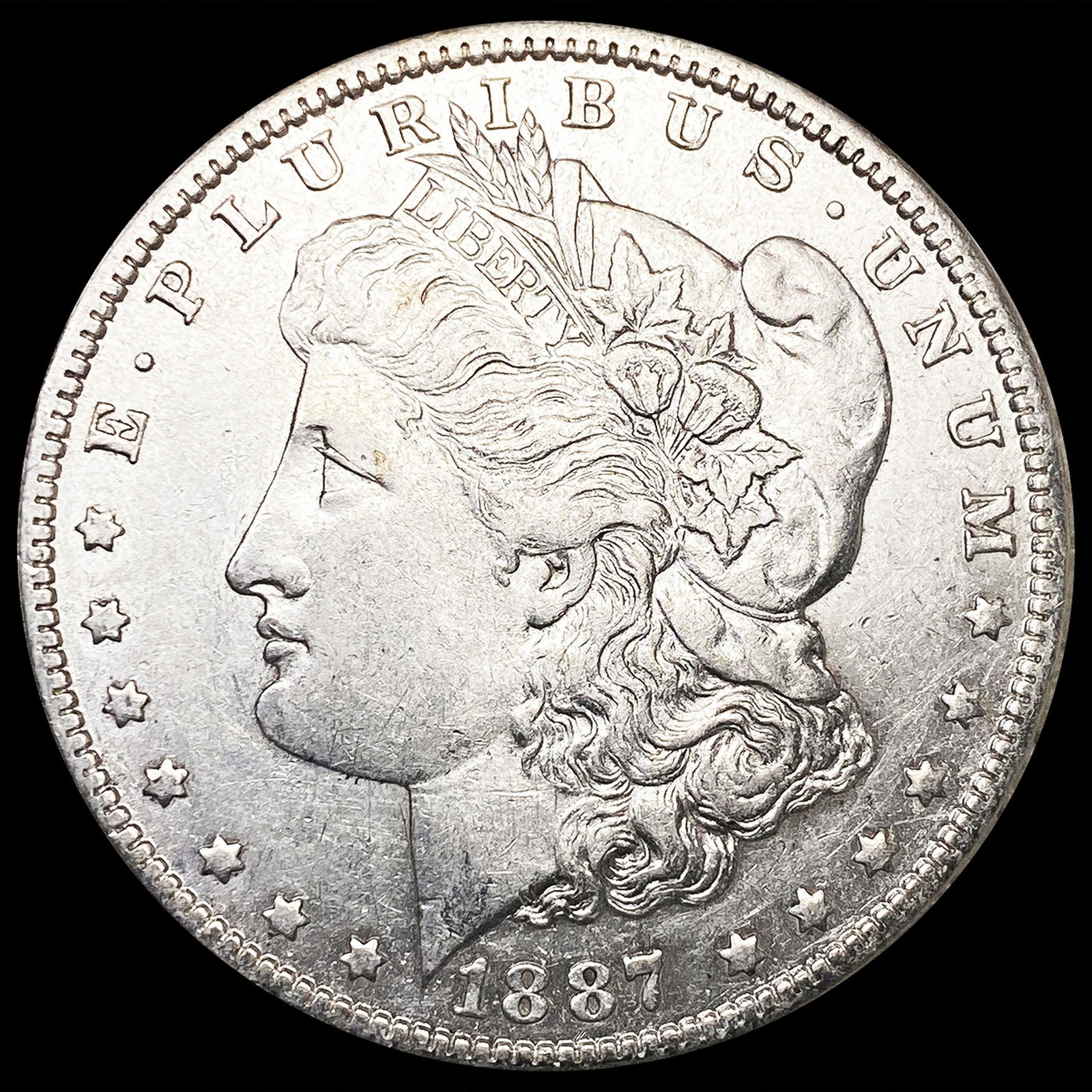 1887-O Morgan Silver Dollar CLOSELY UNCIRCULATED (1 of 2)