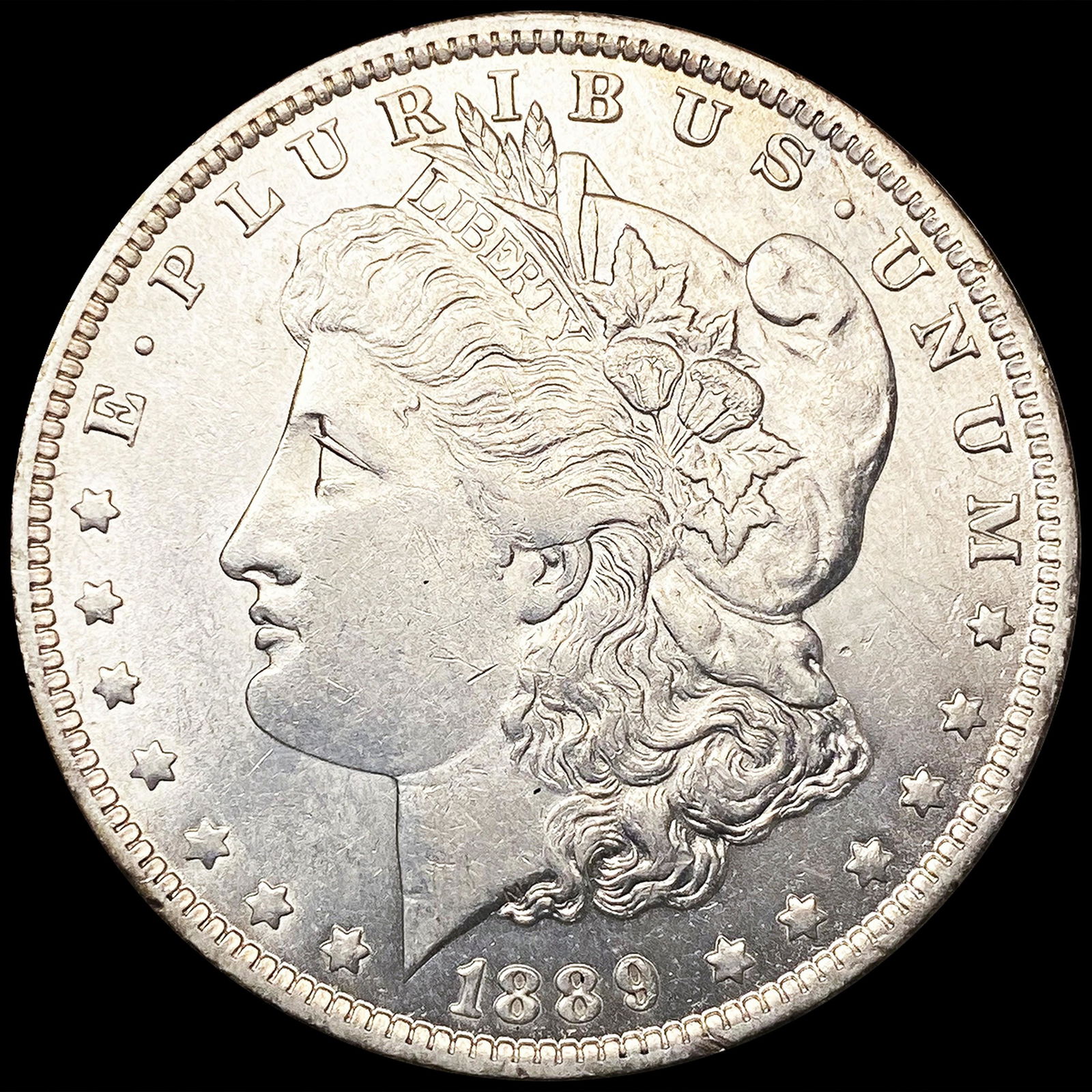 1889-O Morgan Silver Dollar CLOSELY UNCIRCULATED (1 of 2)